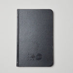 Black UNFPA Embossed Cover Blank Notebook Default Title